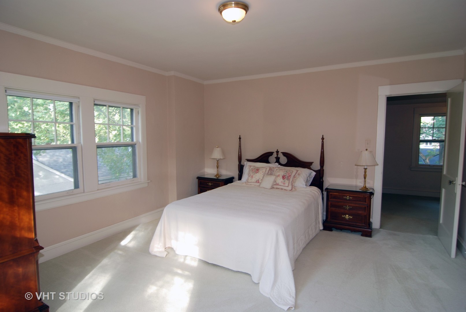 258 Lionel Road Riverside, IL 60546 - Photo 11 of 20 a bedroom with a bed and a window
