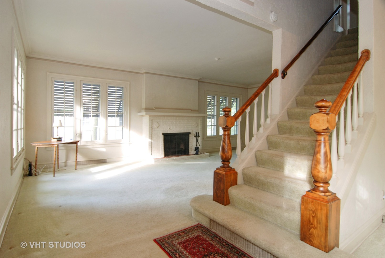 258 Lionel Road Riverside, IL 60546 - Photo 3 of 20 a living room with furniture and a fireplace