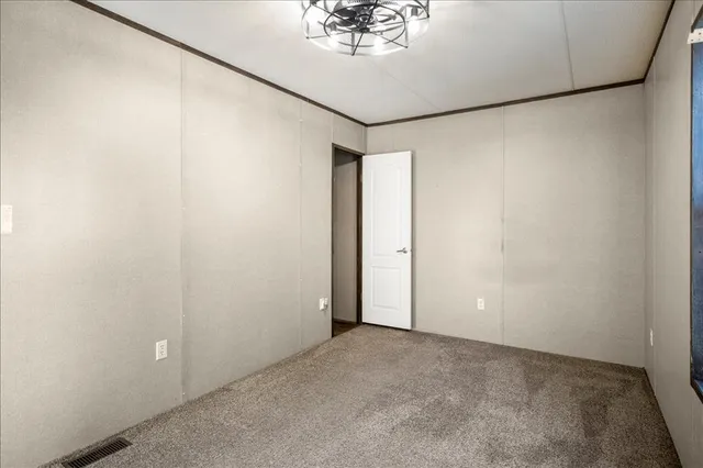 a view of yard with swimming pool and sitting area