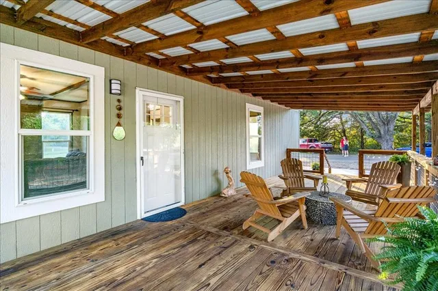 a dining room with furniture and outdoor space