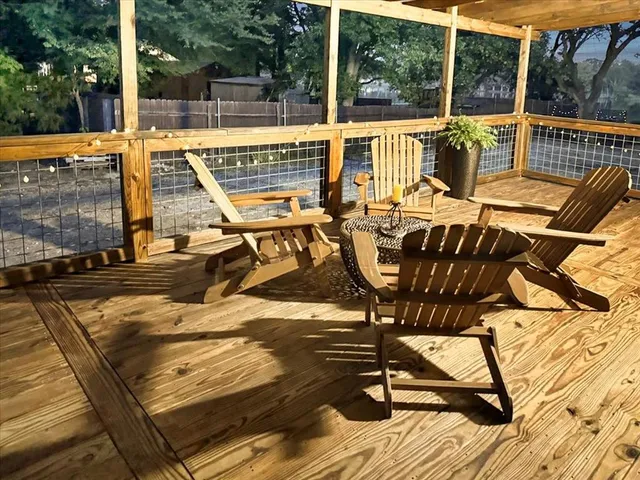 a view of a patio with swimming pool