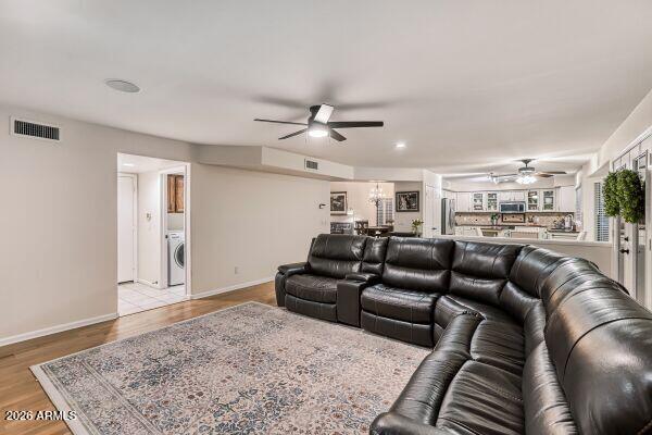 1609 East Mohawk Lane Phoenix, AZ 85024 - Photo 13 of 31 a living room with furniture and a rug