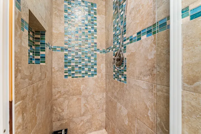 a view of a house with backyard porch and sitting area
