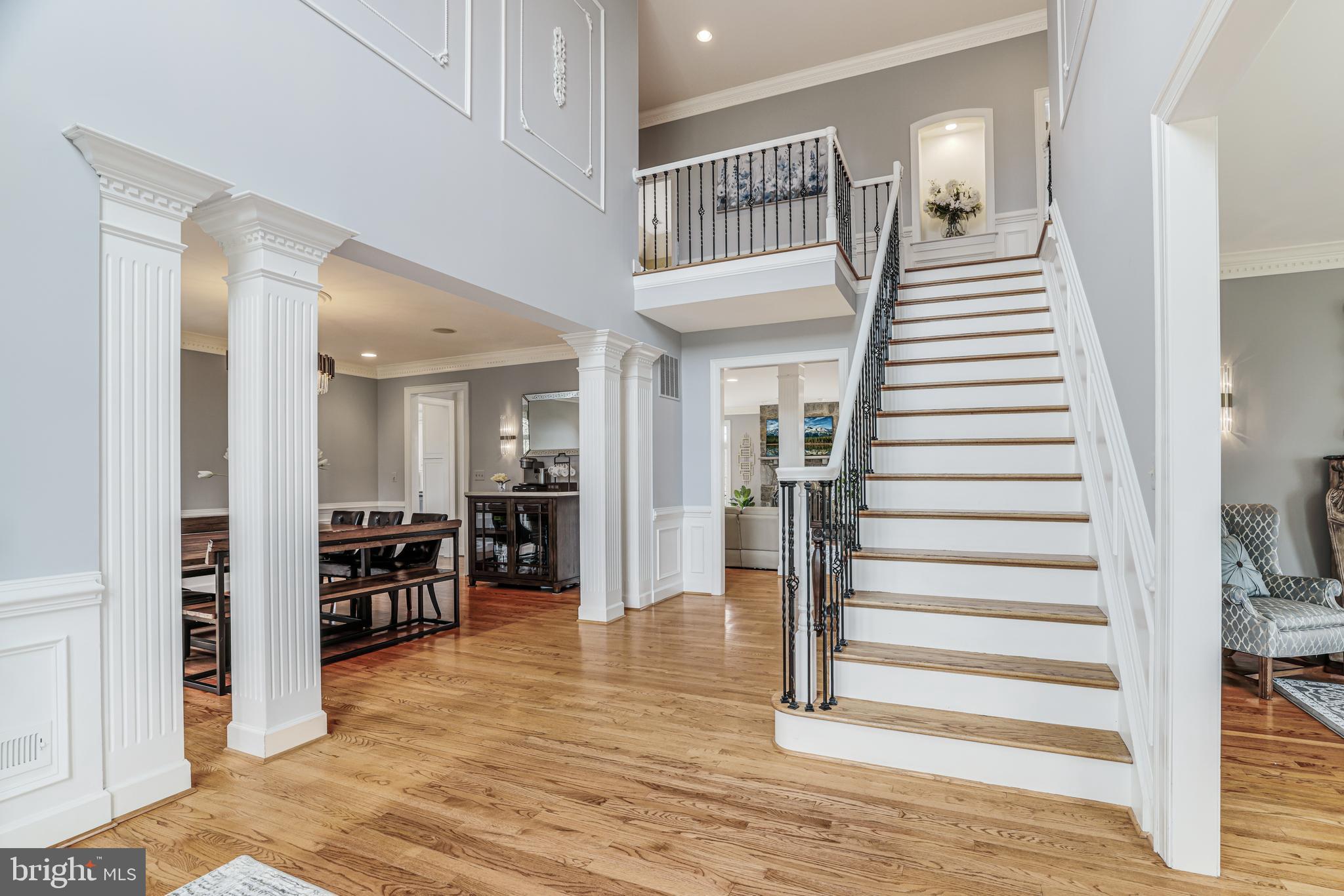 22609 Hillside Circle Leesburg, VA 20175 - Photo 28 of 110 a view of a hallway view with staircase and white walls