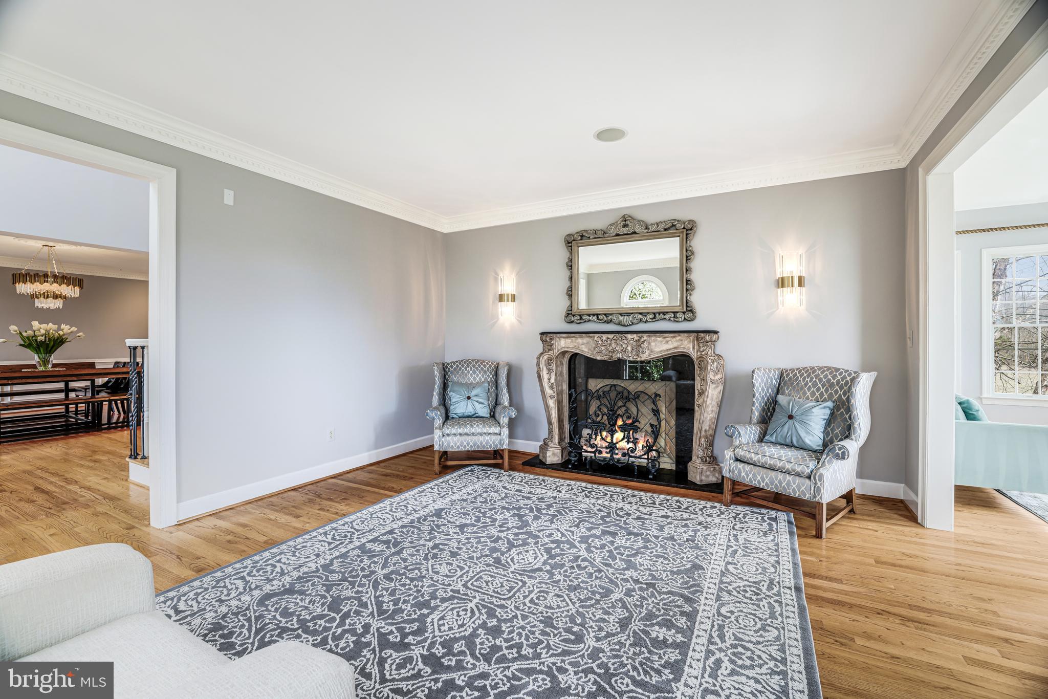 22609 Hillside Circle Leesburg, VA 20175 - Photo 37 of 110 a living room with furniture and a fireplace