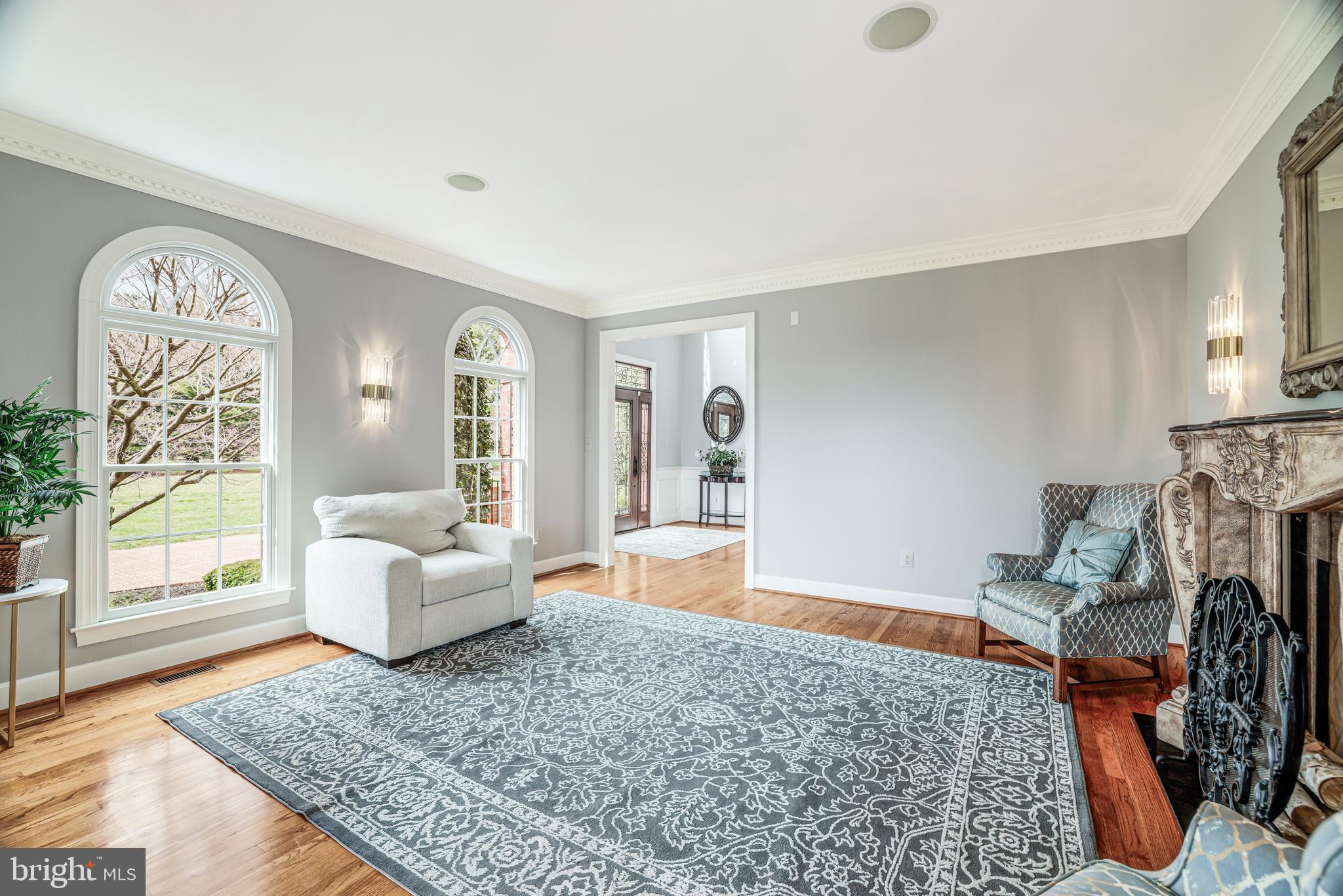 22609 Hillside Circle Leesburg, VA 20175 - Photo 39 of 110 a living room with furniture and a fireplace