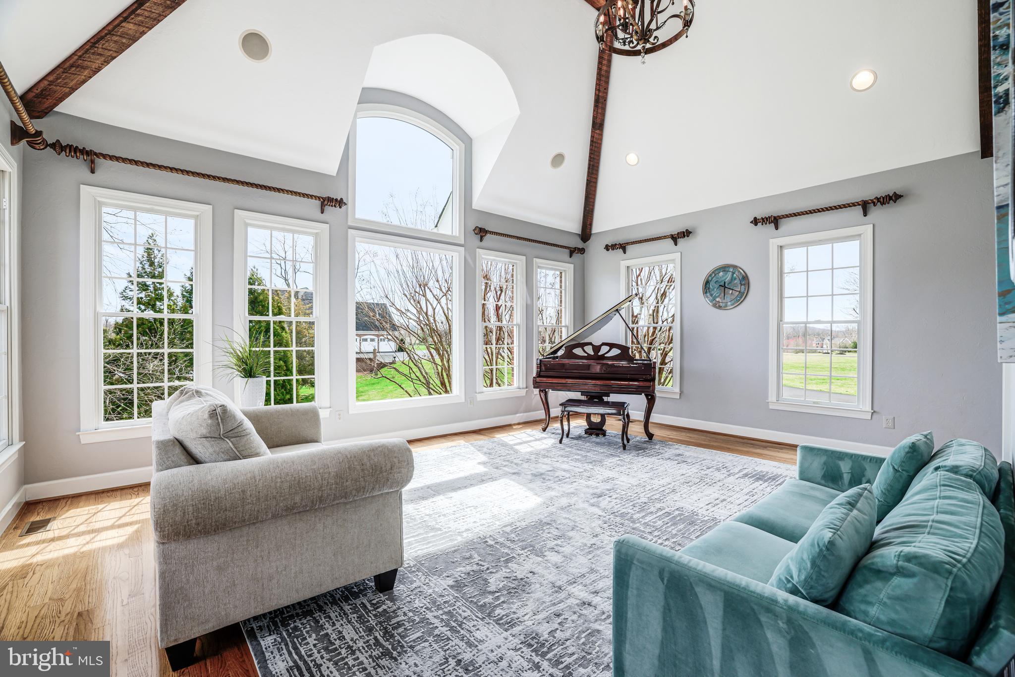 22609 Hillside Circle Leesburg, VA 20175 - Photo 42 of 110 a living room with furniture and a piano
