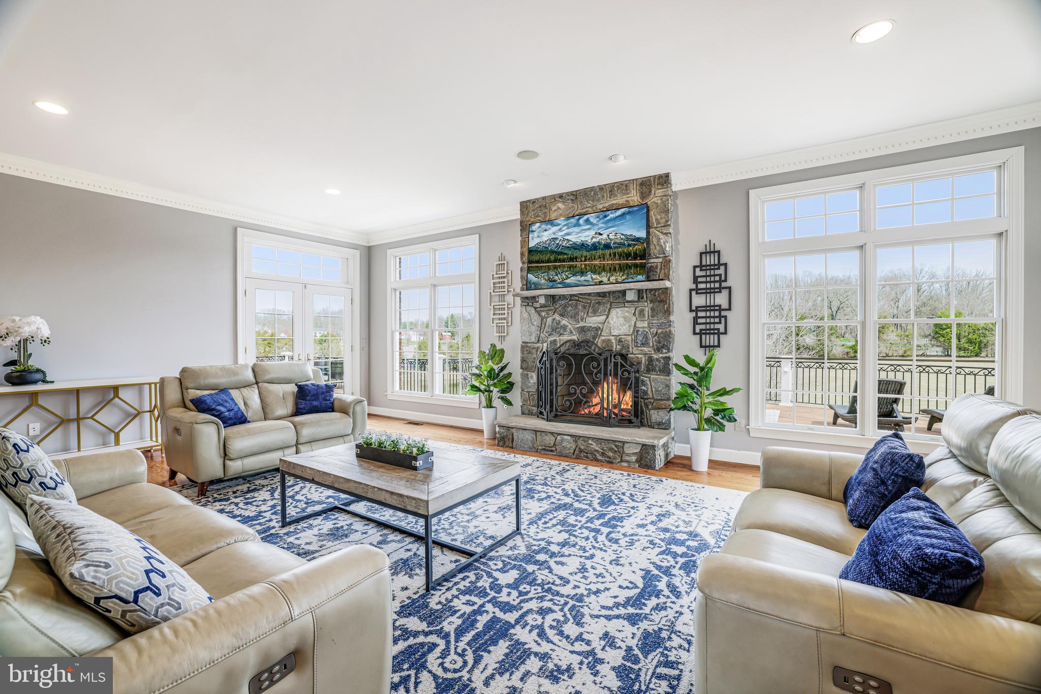 22609 Hillside Circle Leesburg, VA 20175 - Photo 48 of 110 a living room with furniture and a large window