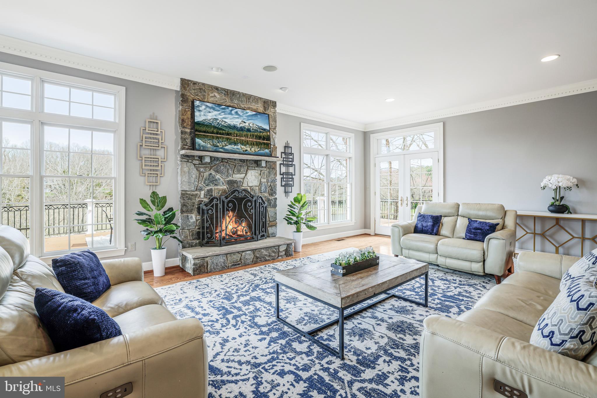 22609 Hillside Circle Leesburg, VA 20175 - Photo 51 of 110 a living room with furniture a rug and a large window
