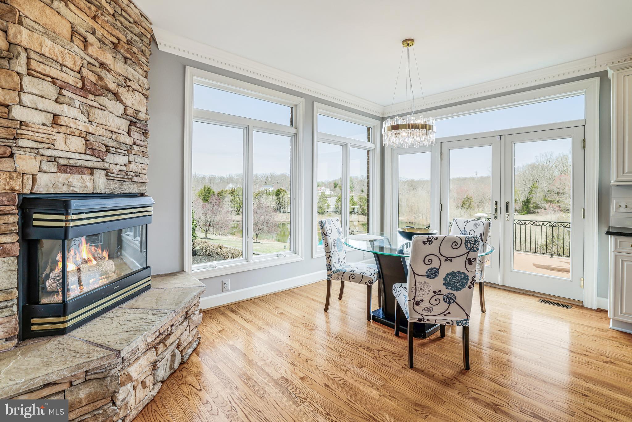 22609 Hillside Circle Leesburg, VA 20175 - Photo 59 of 110 a living room with furniture and a floor to ceiling window