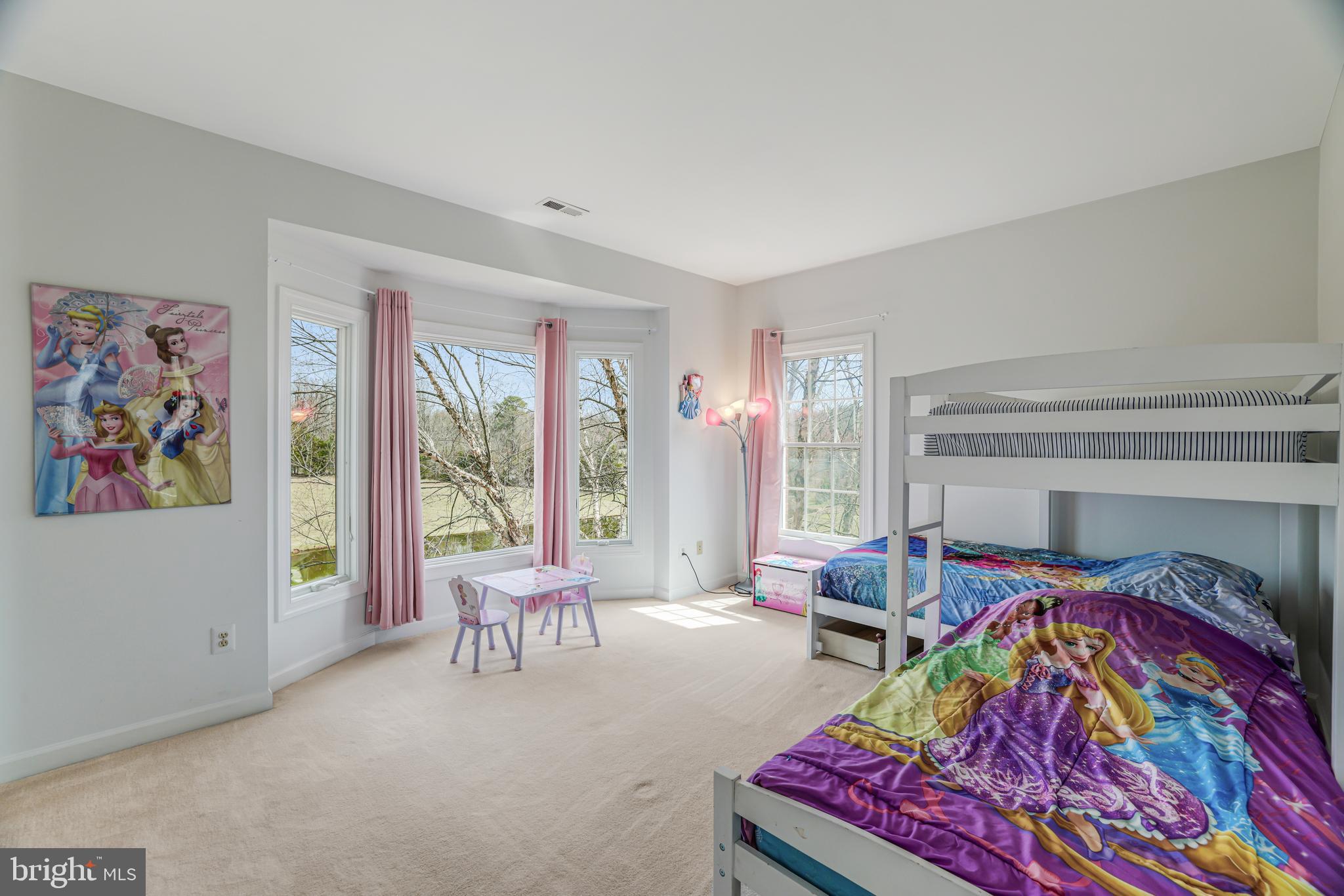22609 Hillside Circle Leesburg, VA 20175 - Photo 67 of 110 a living room with furniture and a floor to ceiling window