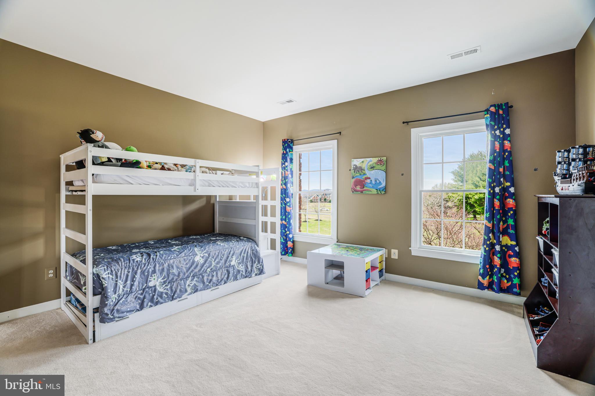 22609 Hillside Circle Leesburg, VA 20175 - Photo 74 of 110 a bedroom with a bed and a couch