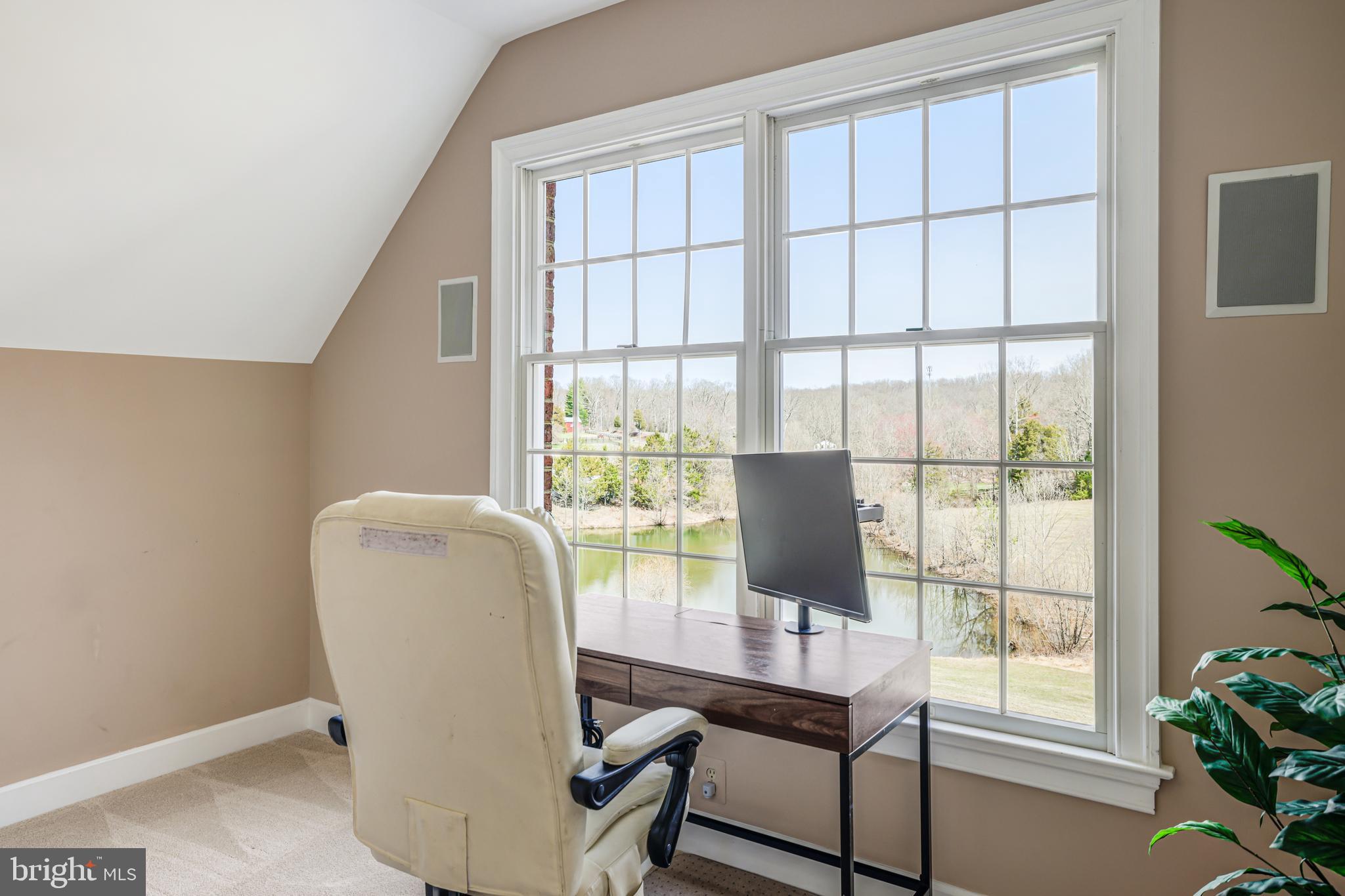 22609 Hillside Circle Leesburg, VA 20175 - Photo 87 of 110 a view of a workspace with furniture and a window