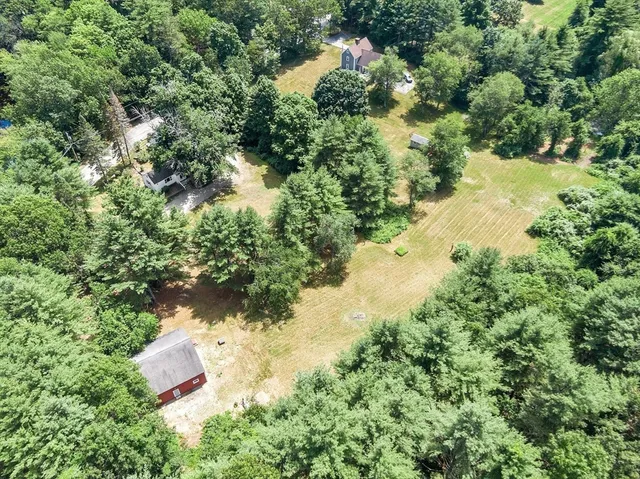 a view of a lake with a yard