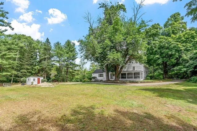 a view of a house with a big yard