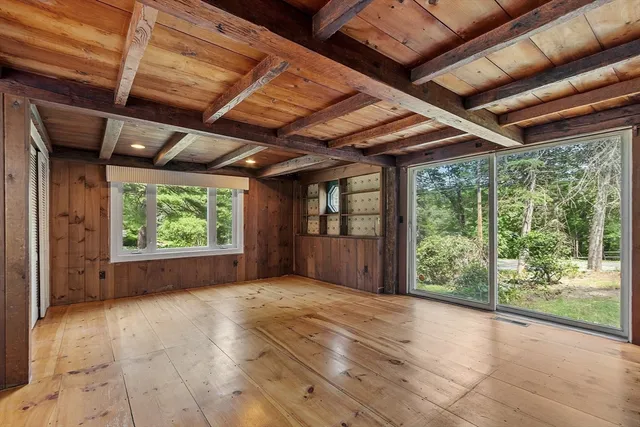 a view of backyard with green space