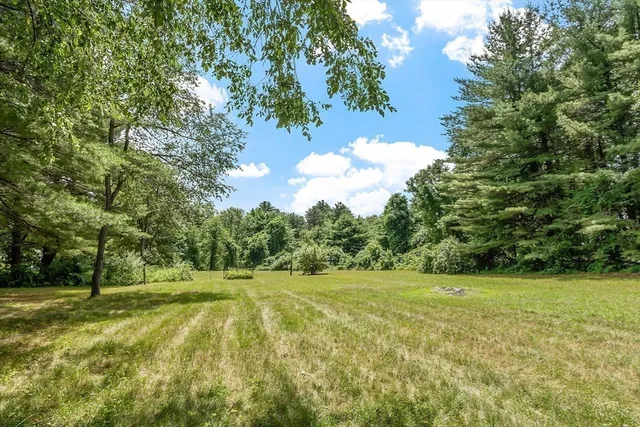 a view of a golf course with a trees