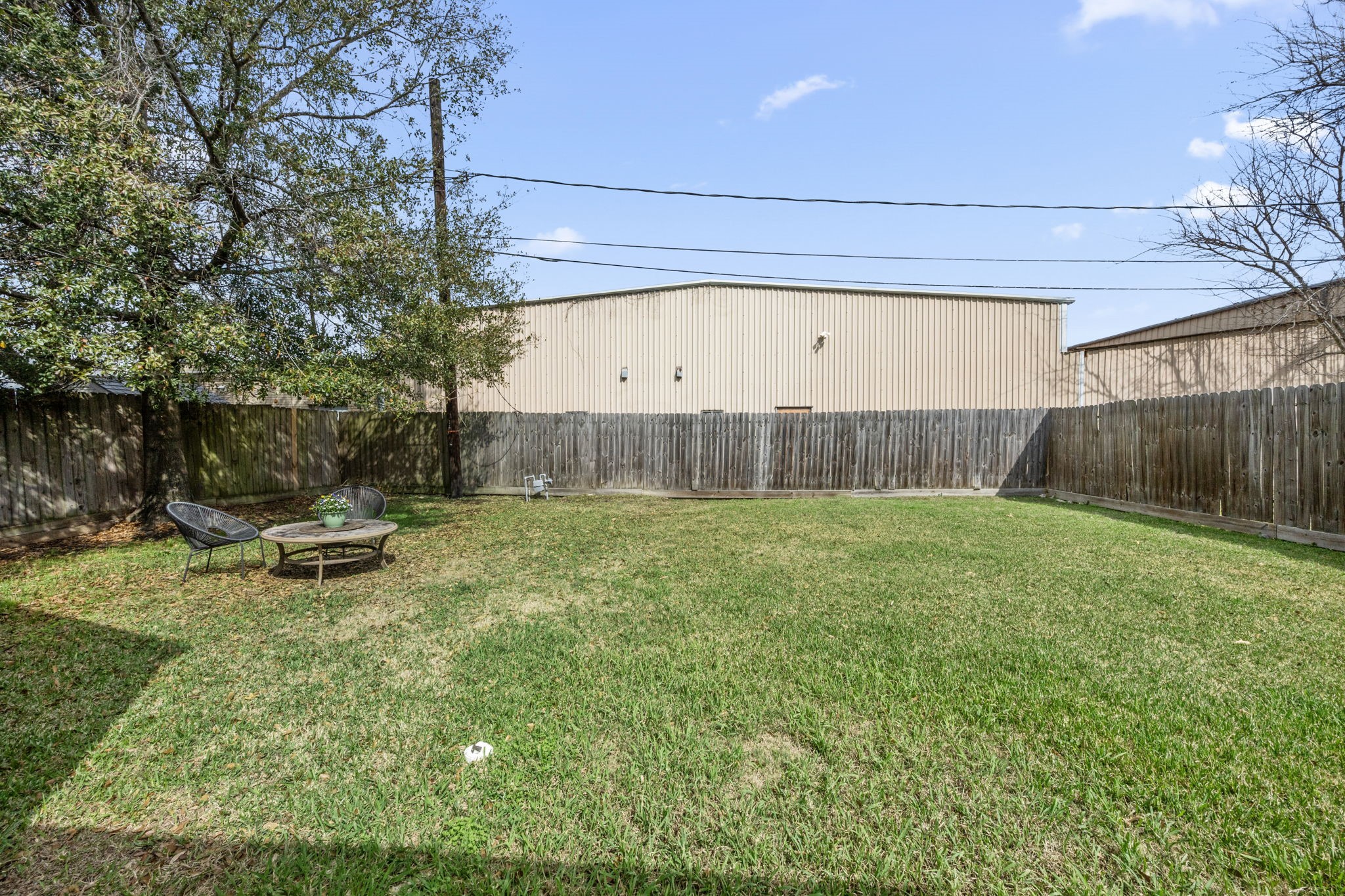 5519 Hillman Street Houston, TX 77023 - Photo 17 of 22 a view of a backyard with a garden