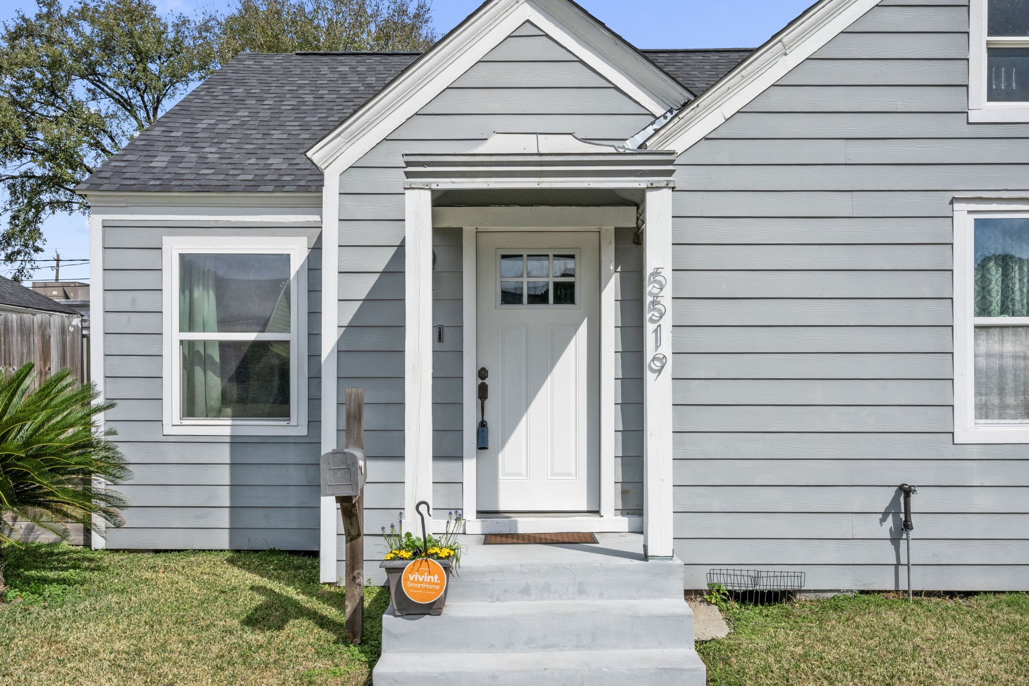 5519 Hillman Street Houston, TX 77023 - Photo 21 of 22 a front view of a house with a garden