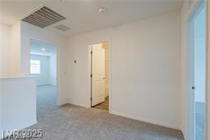 12347 Indigo Montage Road, Unit 3 Las Vegas, NV 89183 - Photo 17 of 23 A well-lit landing area connects multiple rooms within this inviting upper level.