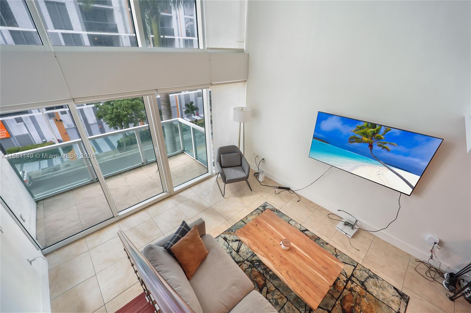 41 Southeast 5th Street, Unit 304 Miami, FL 33131 - Photo 7 of 16 a view of balcony with furniture