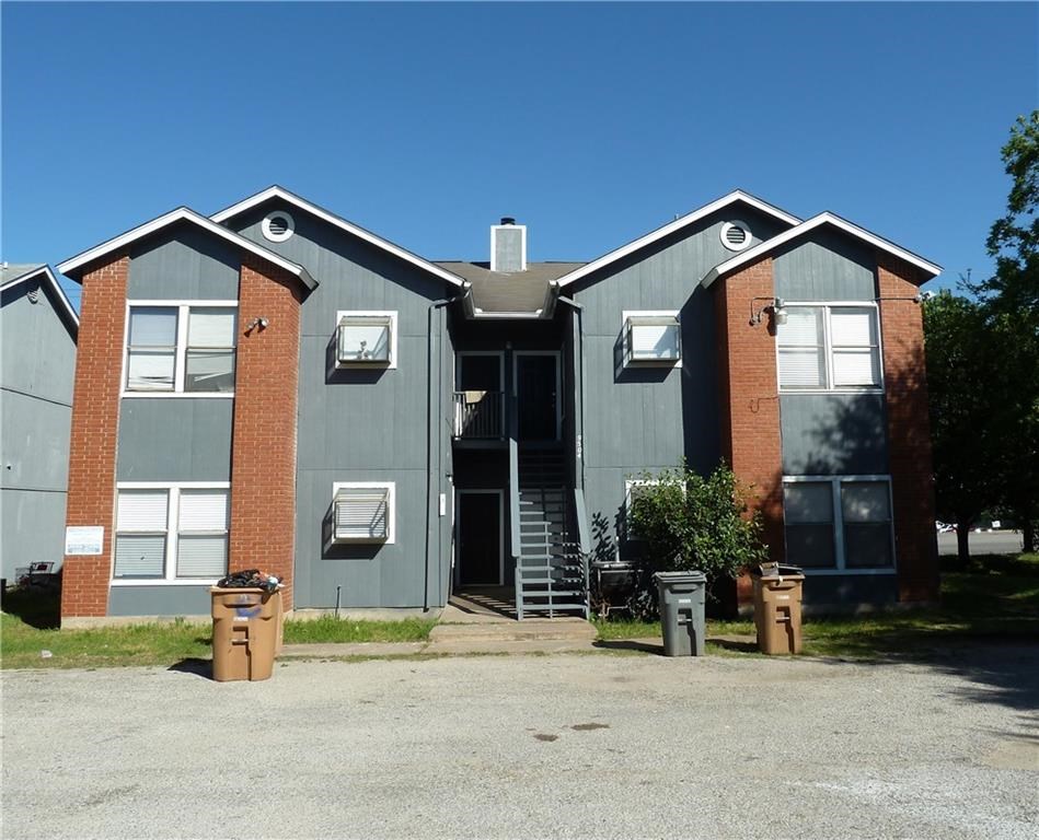 a front view of a house with patio