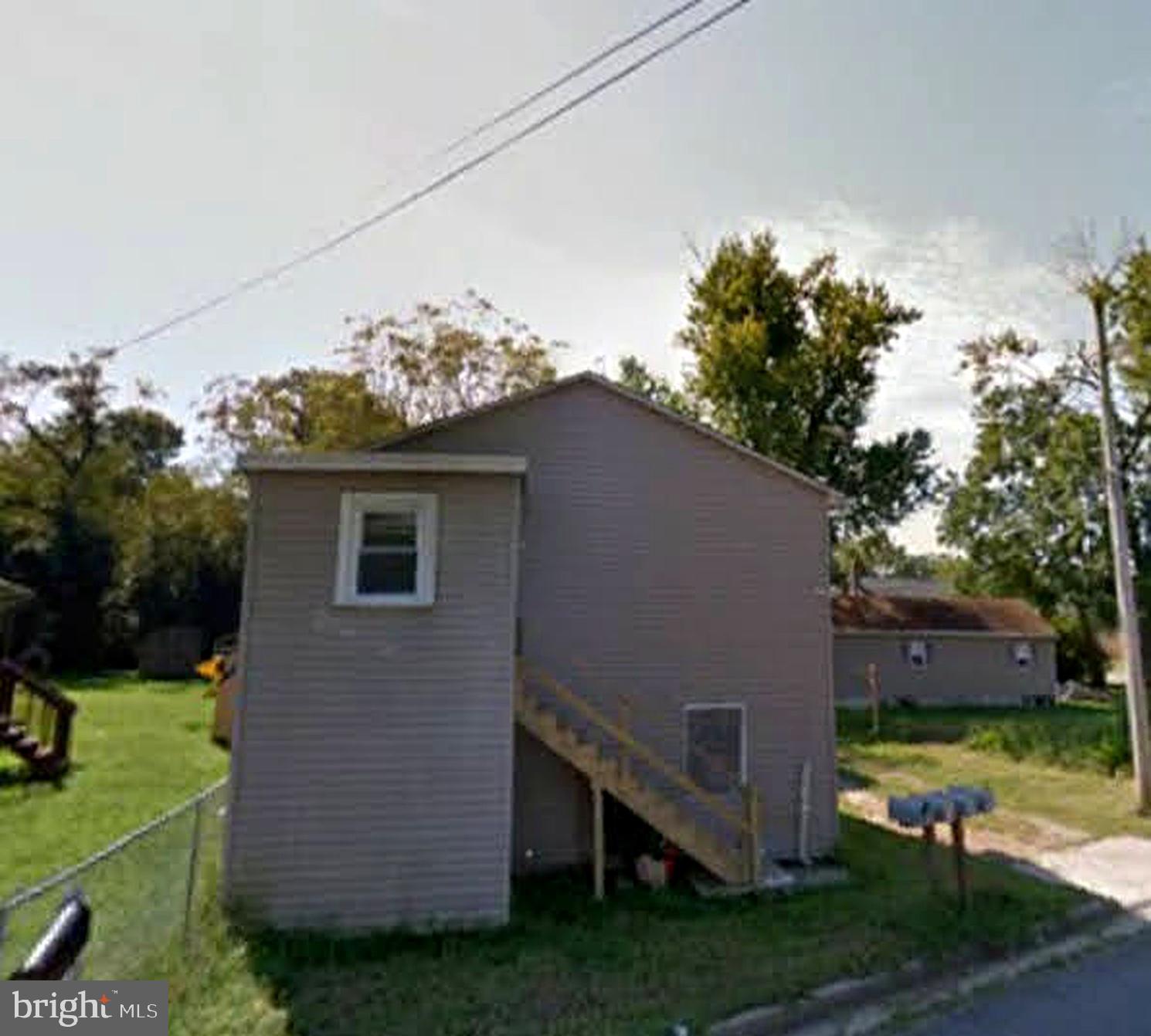 30 Davis Avenue Salem, NJ 08079 - Photo 2 of 3 a view of a house with a yard