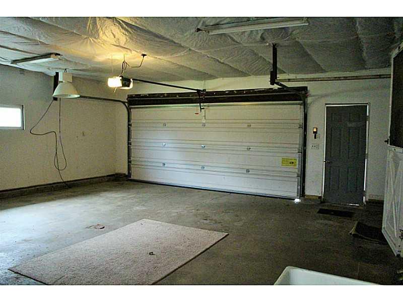 110 Mitchell Road West Middlesex, PA 16159 - Photo 11 of 12 Parking Lot/Garage. Extra wide garage provides extra storage space