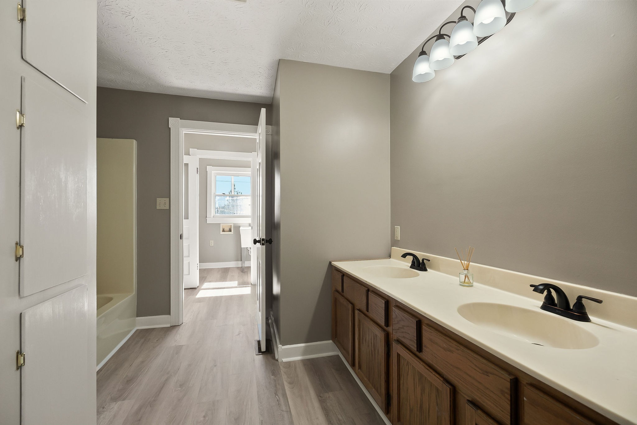 415 Allen Ferry Road Smithville, TN 37166 - Photo 18 of 41 a bathroom with a sink and a mirror