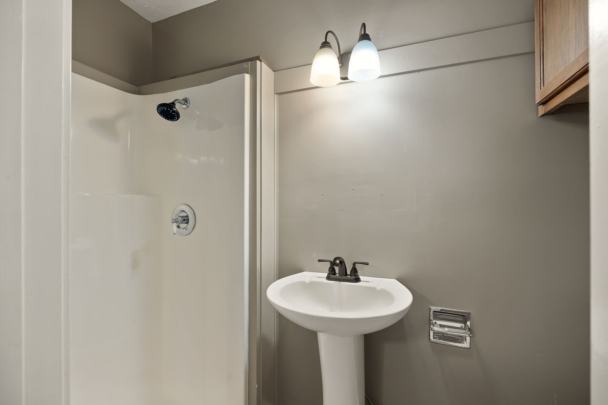 415 Allen Ferry Road Smithville, TN 37166 - Photo 21 of 41 a bathroom with a sink a mirror and shower