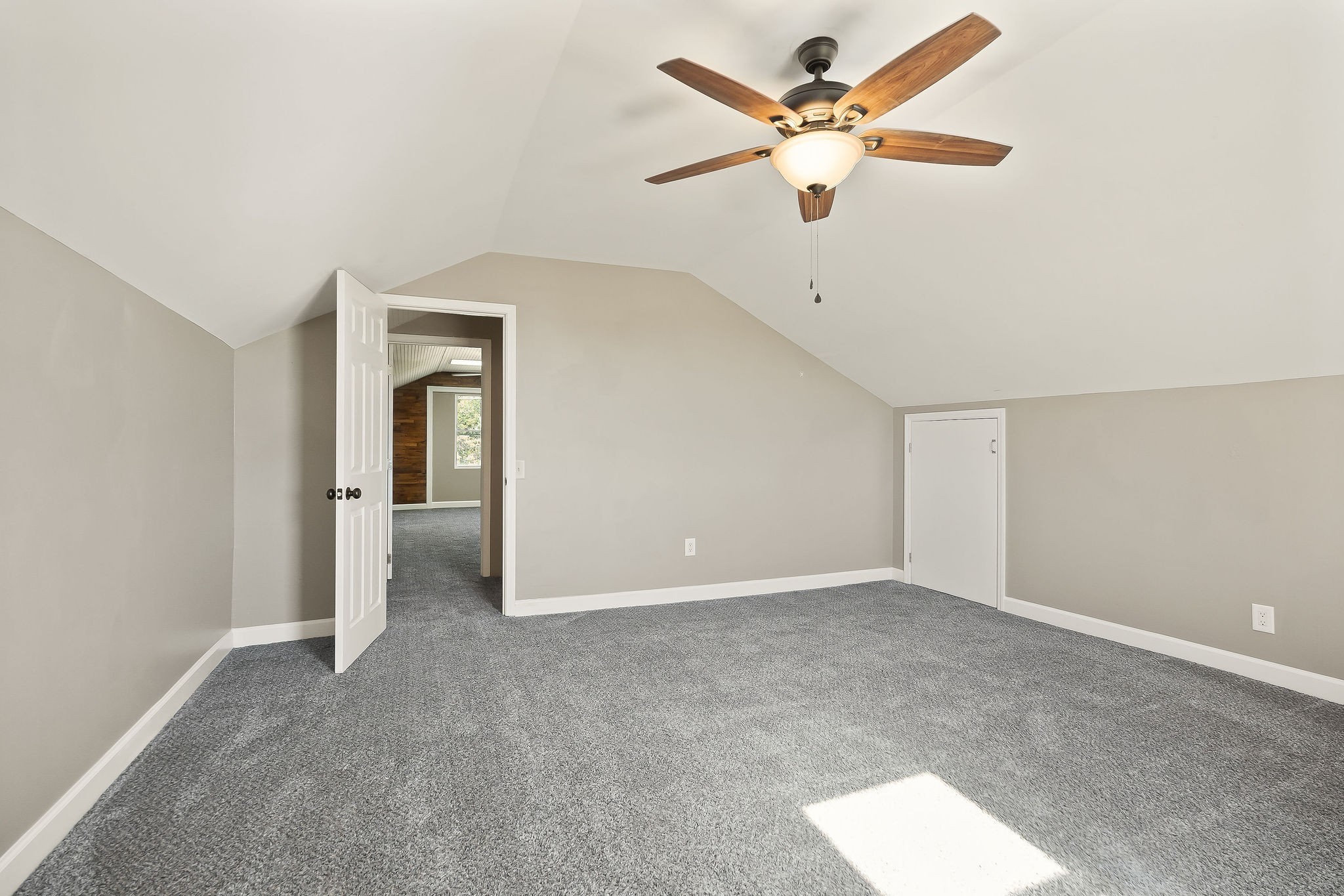 415 Allen Ferry Road Smithville, TN 37166 - Photo 32 of 41 a view of an empty room with a ceiling fan