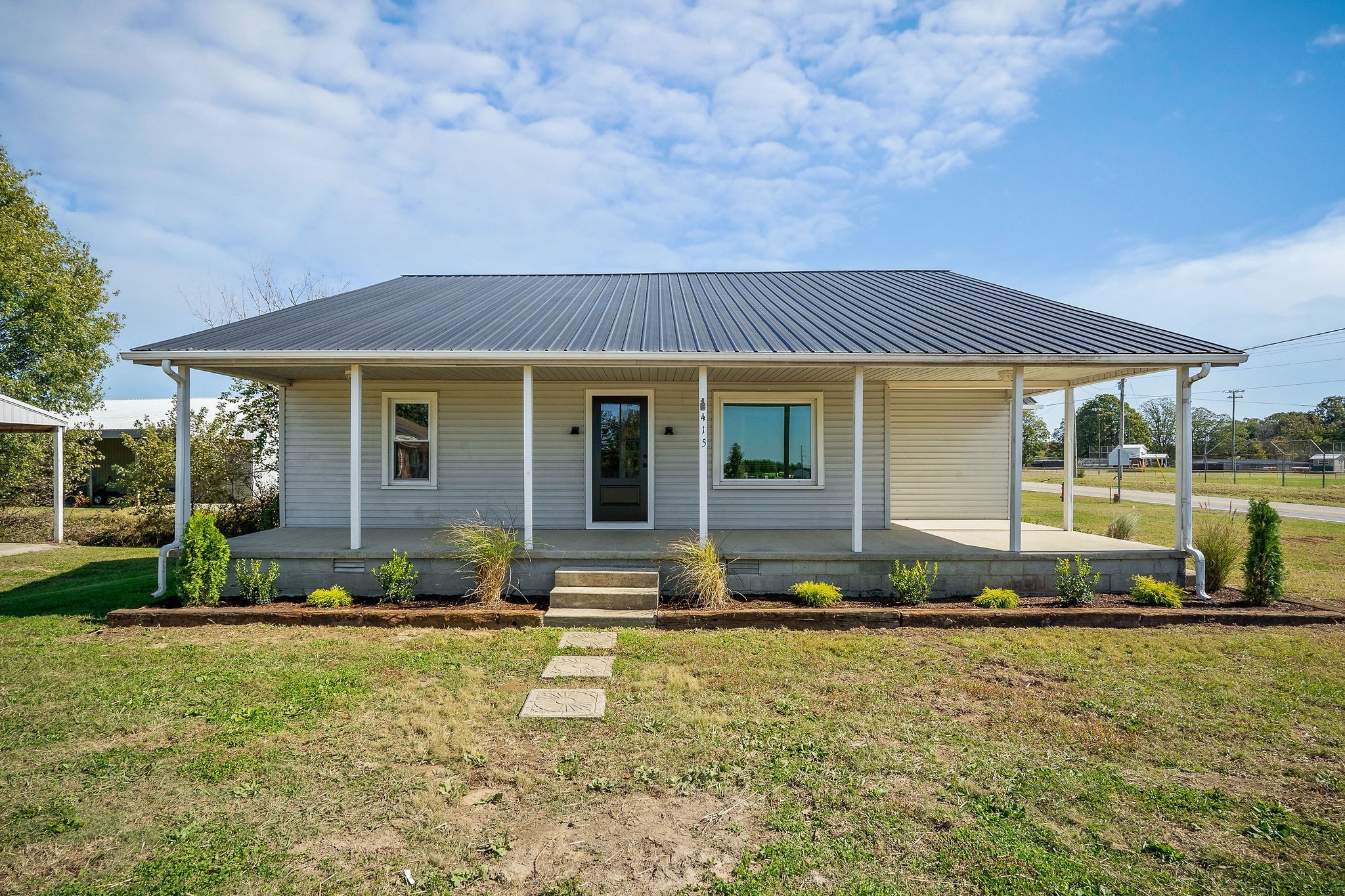415 Allen Ferry Road Smithville, TN 37166 - Photo 38 of 41 a front view of a house with garden