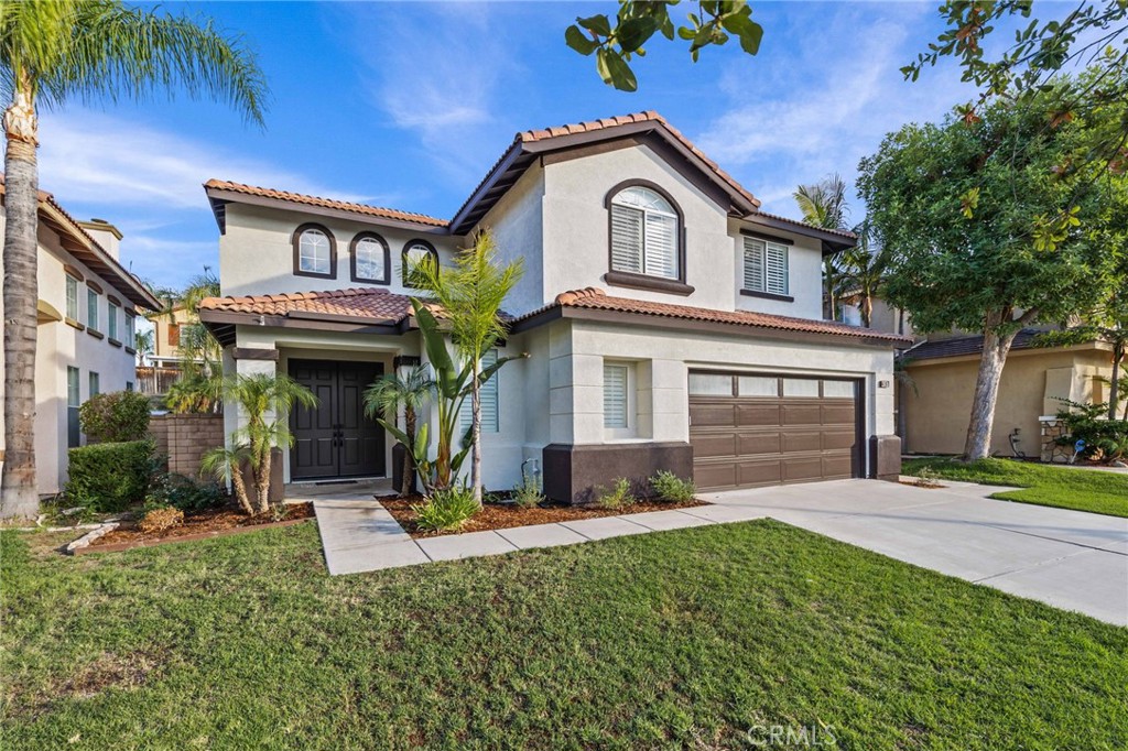 4397 Player Road Corona, CA 92883 - Photo 1 of 1 a front view of a house with a yard