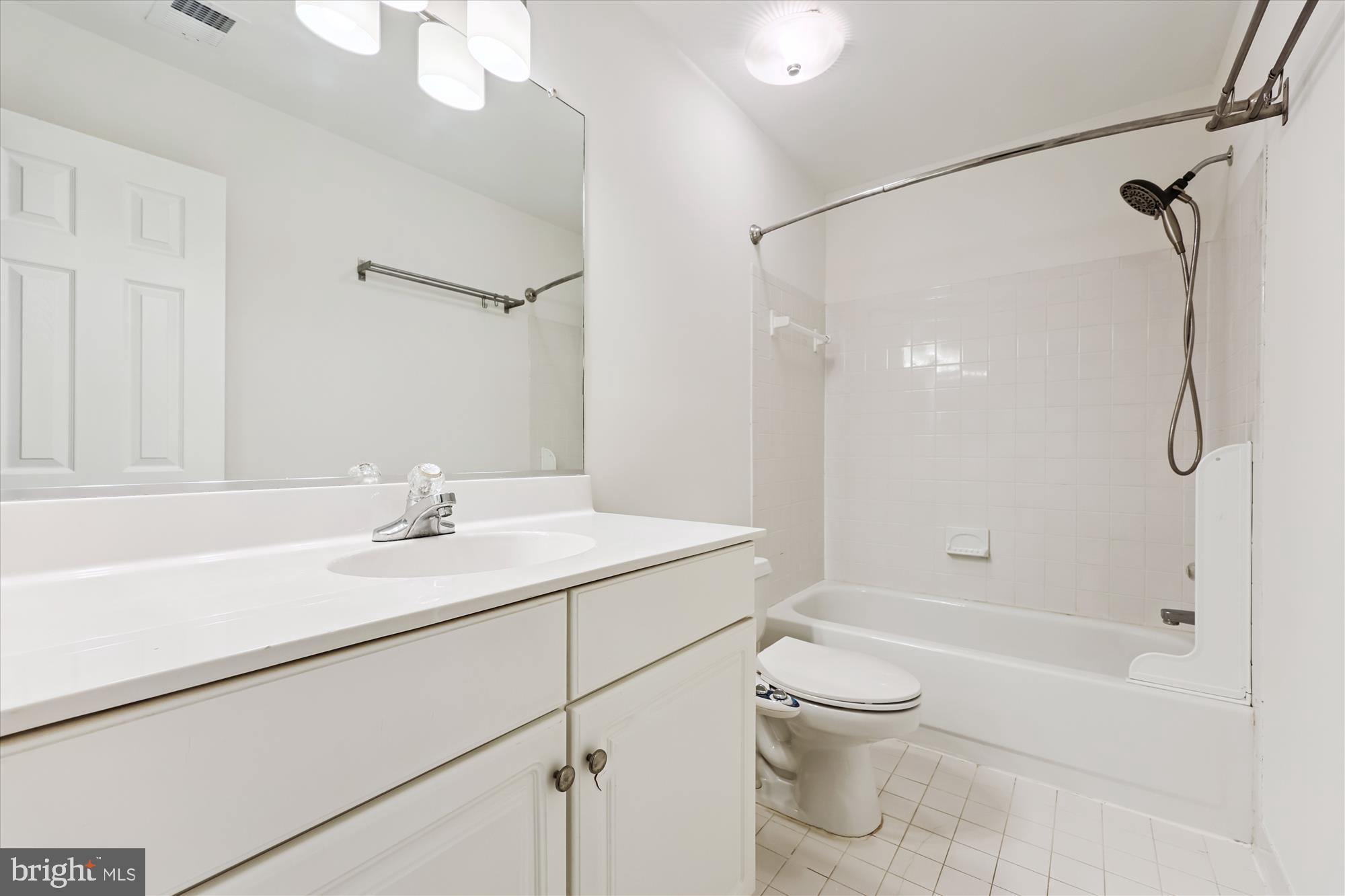 473 Tschiffely Square Road Gaithersburg, MD 20878 - Photo 33 of 64 a bathroom with a granite countertop sink toilet and shower