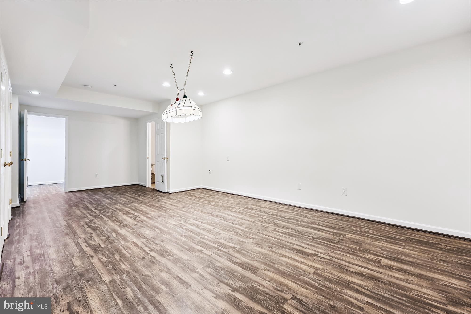473 Tschiffely Square Road Gaithersburg, MD 20878 - Photo 35 of 64 a view of a livingroom with wooden floor