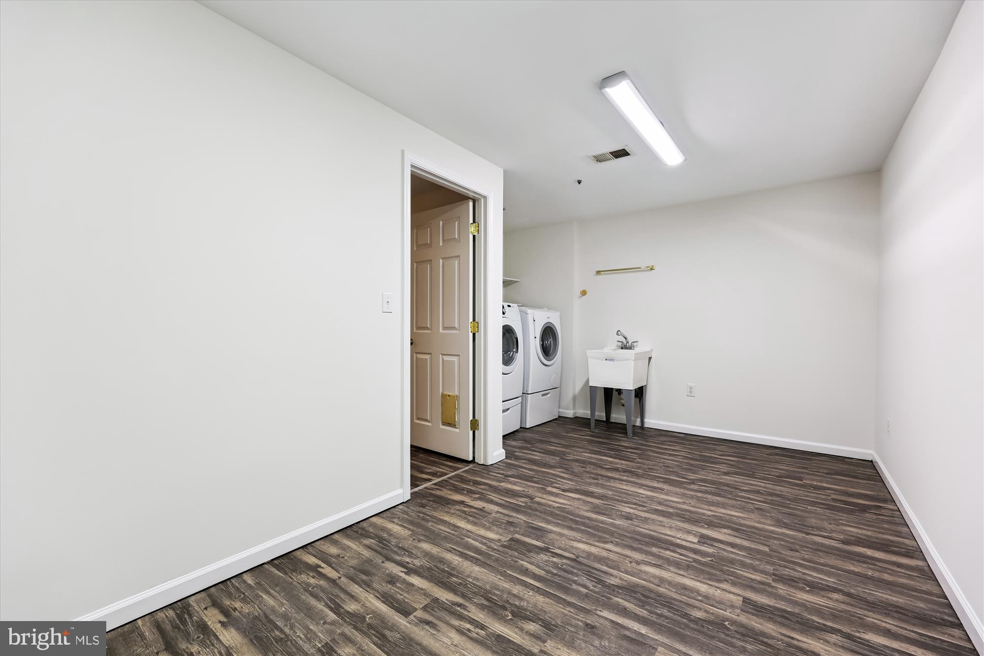 473 Tschiffely Square Road Gaithersburg, MD 20878 - Photo 38 of 64 a view of a room with wooden floor and stairs
