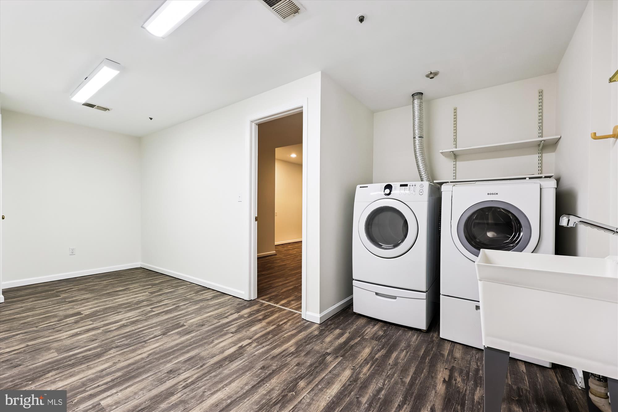 473 Tschiffely Square Road Gaithersburg, MD 20878 - Photo 39 of 64 a view of a storage & utility room with washer and dryer