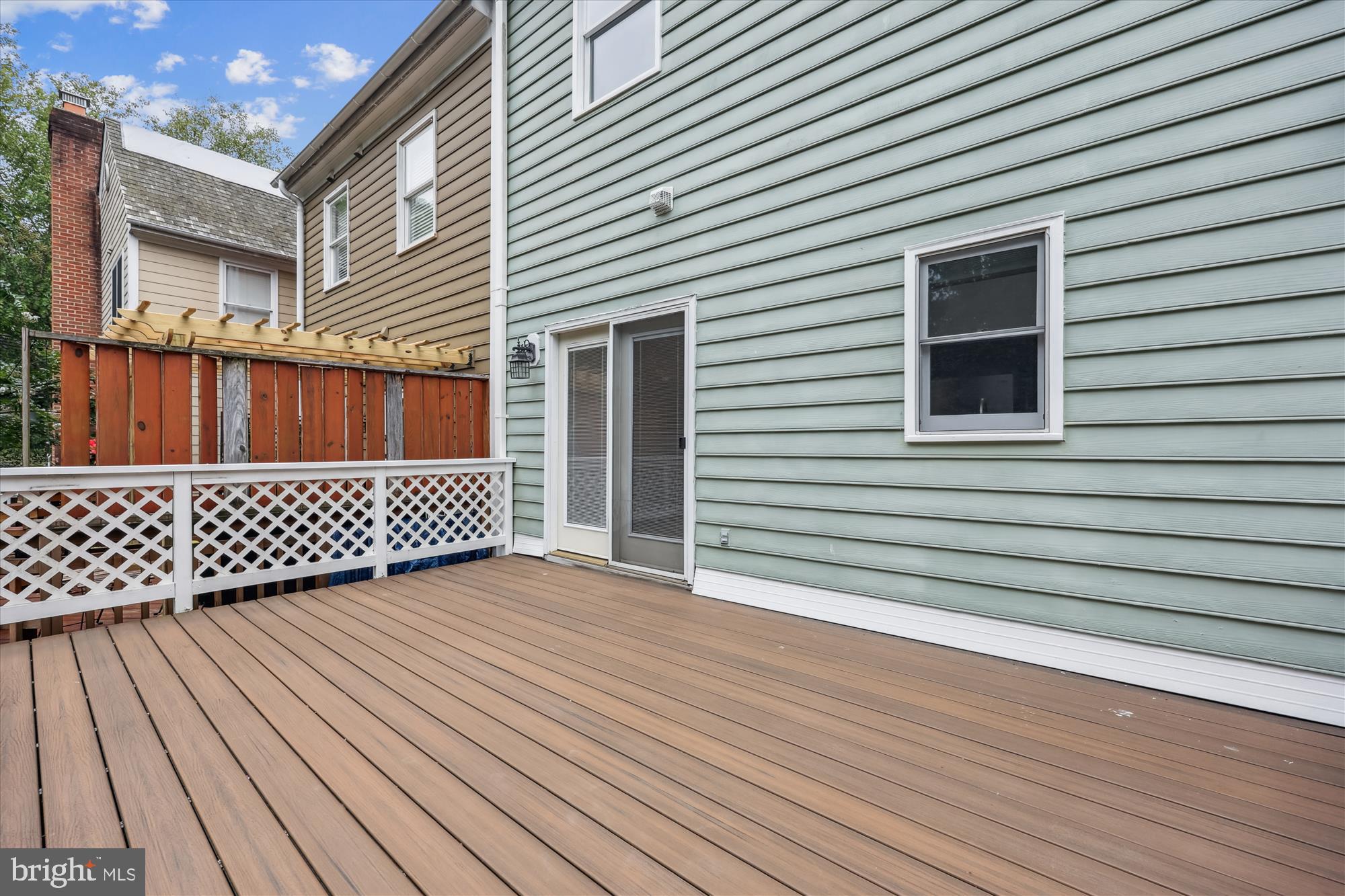 473 Tschiffely Square Road Gaithersburg, MD 20878 - Photo 44 of 64 a view of a wooden deck