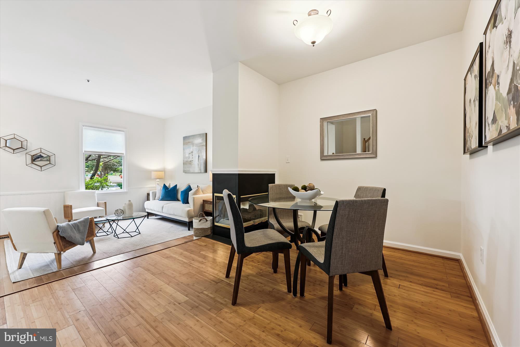 473 Tschiffely Square Road Gaithersburg, MD 20878 - Photo 6 of 64 a living room with furniture and wooden floor