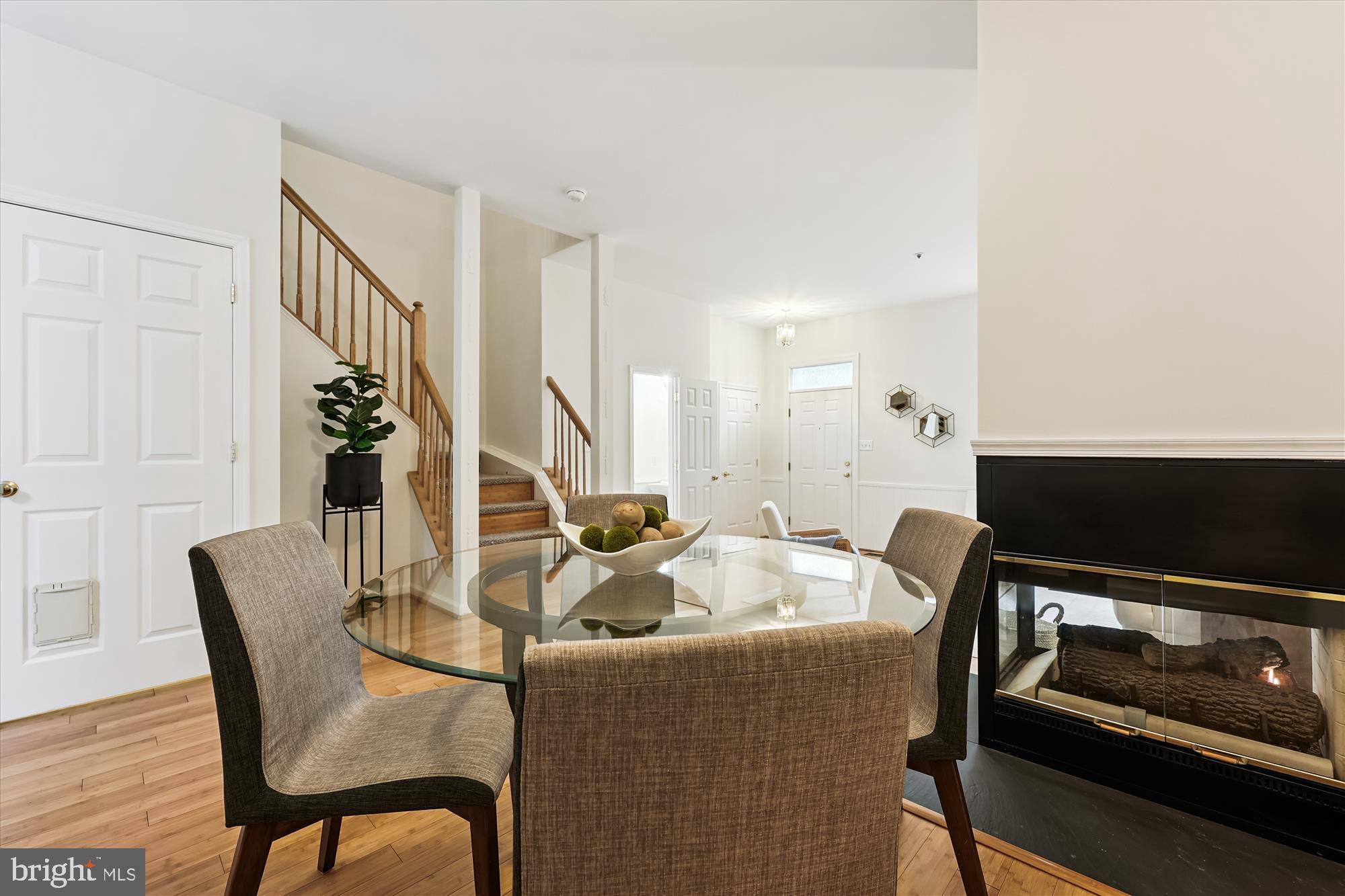 473 Tschiffely Square Road Gaithersburg, MD 20878 - Photo 7 of 64 a living room with furniture and wooden floor