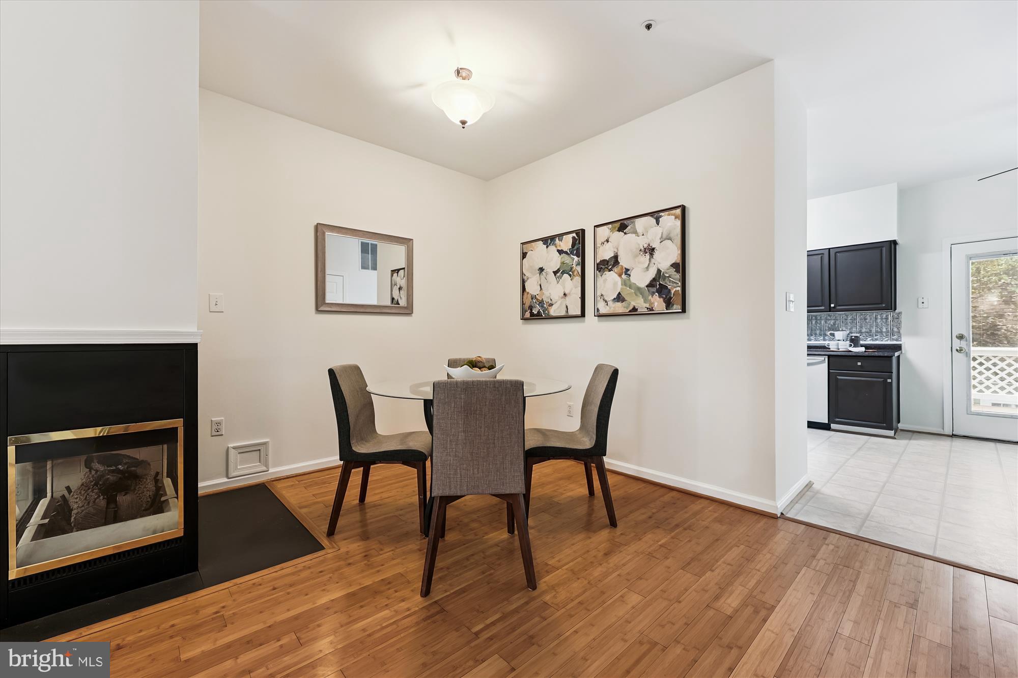 473 Tschiffely Square Road Gaithersburg, MD 20878 - Photo 8 of 64 a view of a dining room with furniture and wooden floor