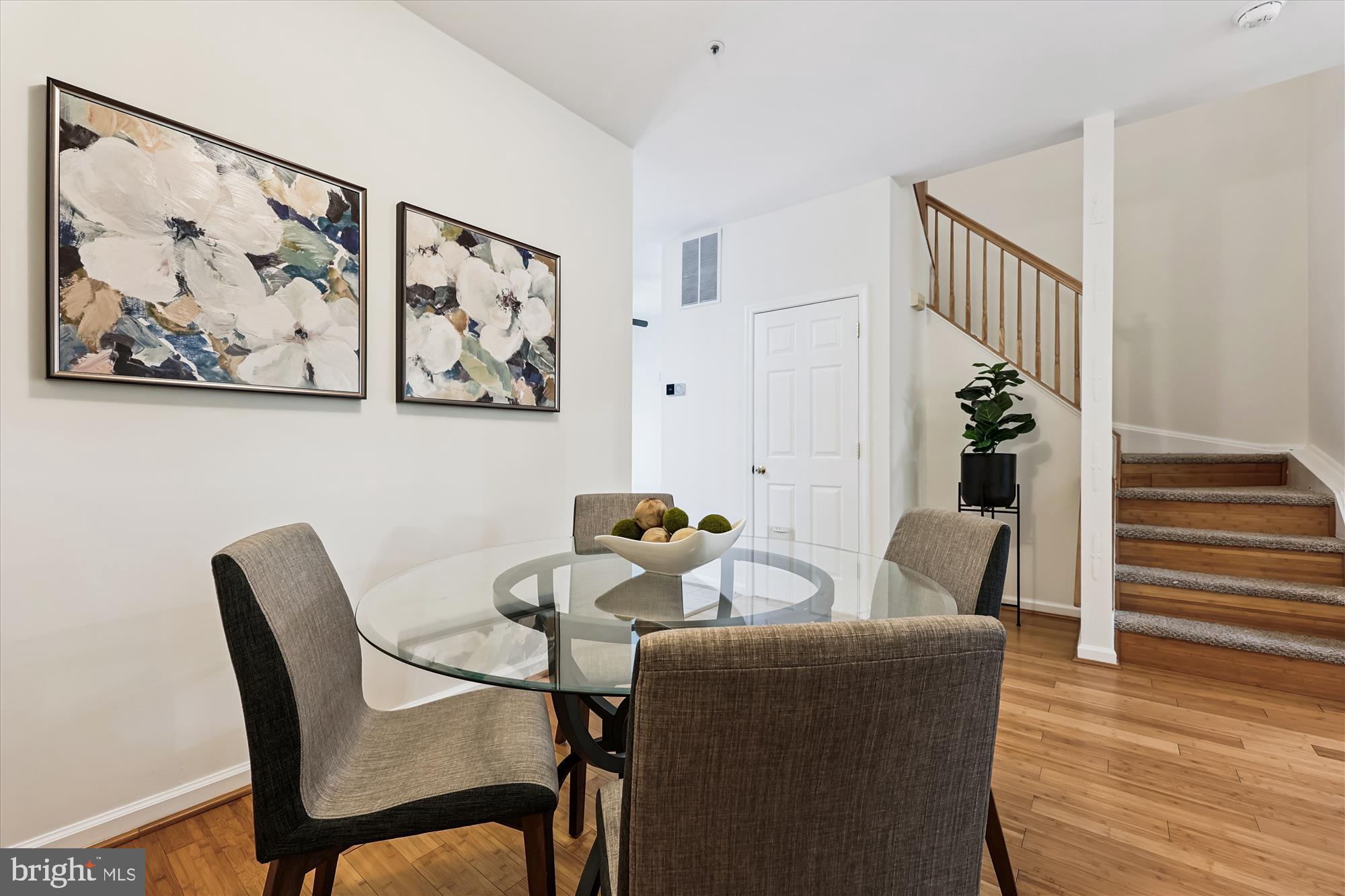 473 Tschiffely Square Road Gaithersburg, MD 20878 - Photo 9 of 64 a dining room with furniture and wooden floor