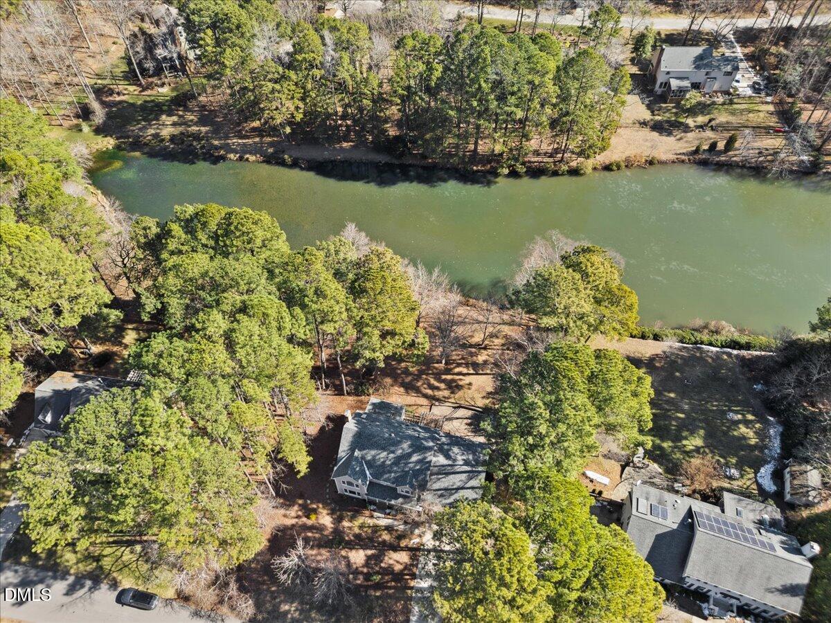 10708 Trappers Creek Drive Raleigh, NC 27614 - Photo 62 of 66 an aerial view of a houses with a lake view