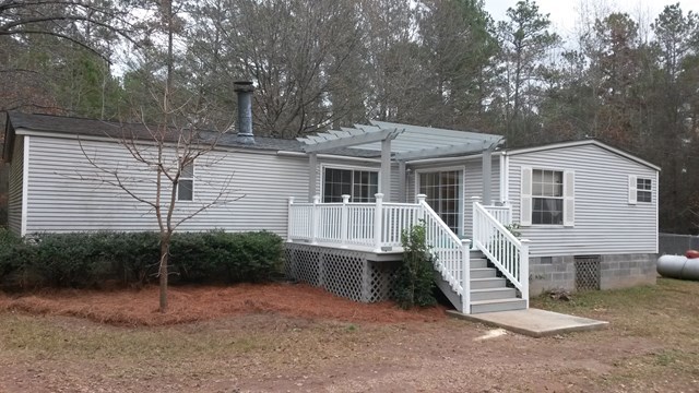 177 Cyler Road Gray, GA 31032 - Photo 4 of 15 a view of a house with a yard