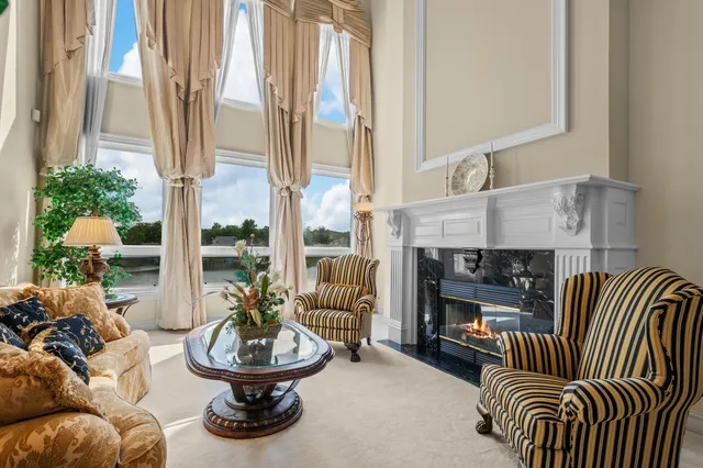 a view of a kitchen with wooden floor and staircase