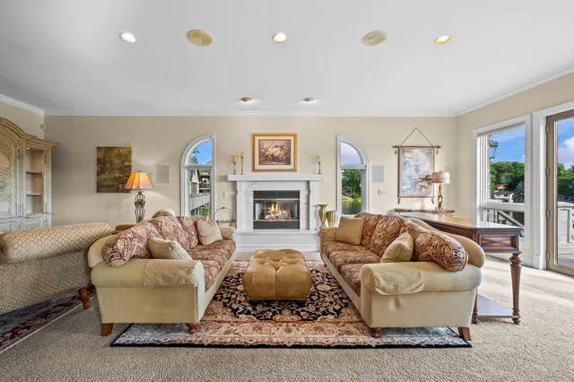 a view of a patio with a chairs and table in a patio