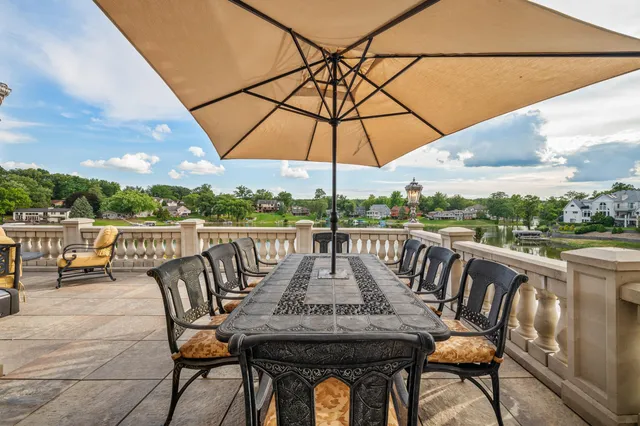 a bathroom with a tub a double vanity sink a mirror and a bathtub