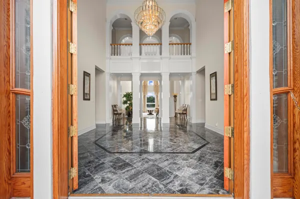 a bedroom with a bed and a dresser in it