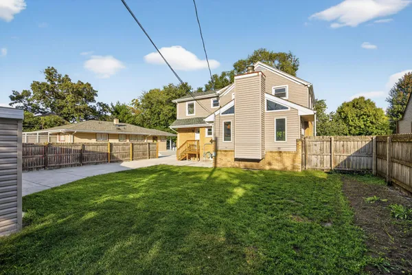 a house view with a garden space
