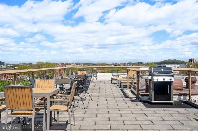 a view of a terrace with furniture
